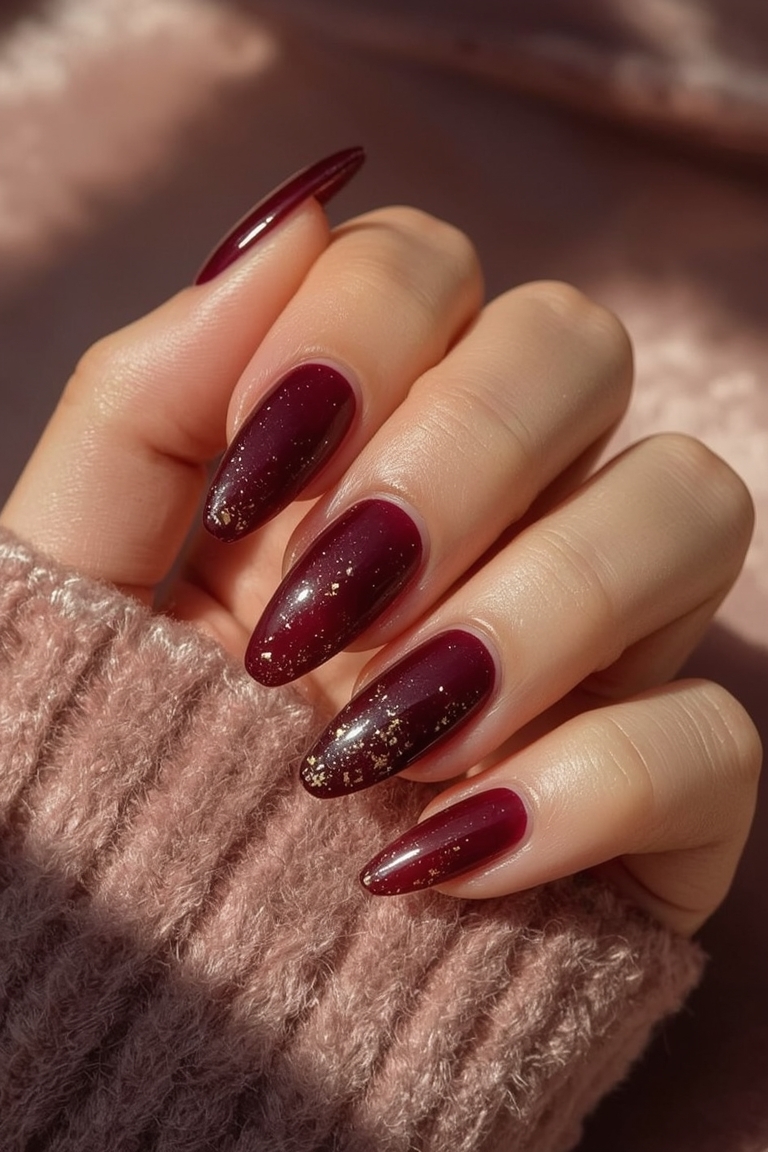 Burgundy Gold Foil Gel Nails on Velvet