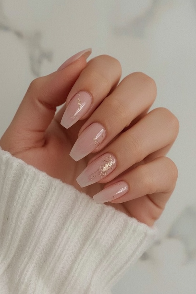 Gilded Elegance: Gel Nail Art with Gold Flakes